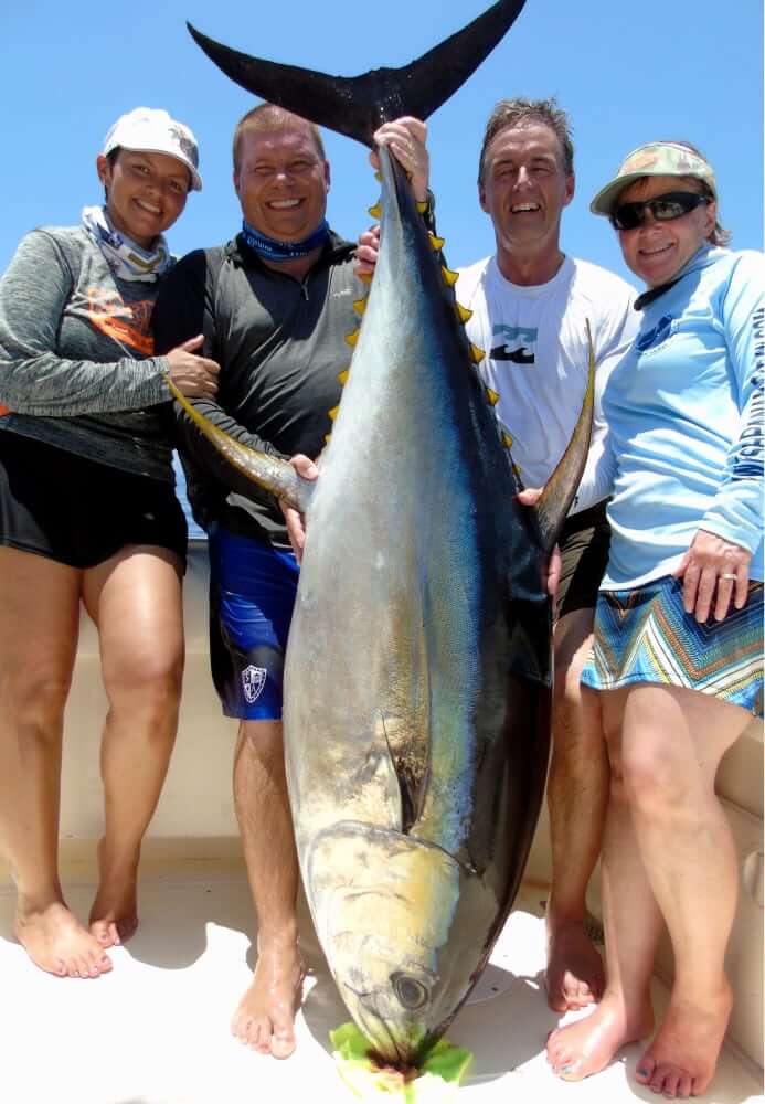 4 anglers with monster 240 pound tuna