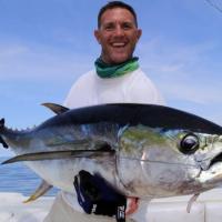 Capt. Shane Jarvis holding a yellowfin tuna