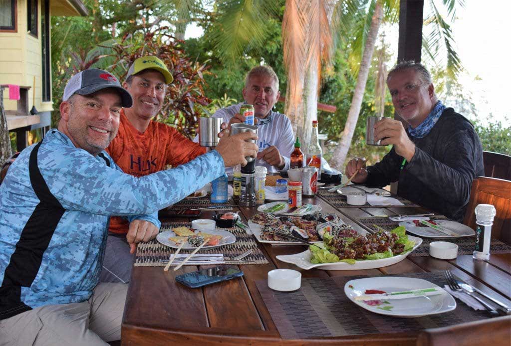 4 anglers enjoying cocktails at Sport Fish Panama Island Lodge