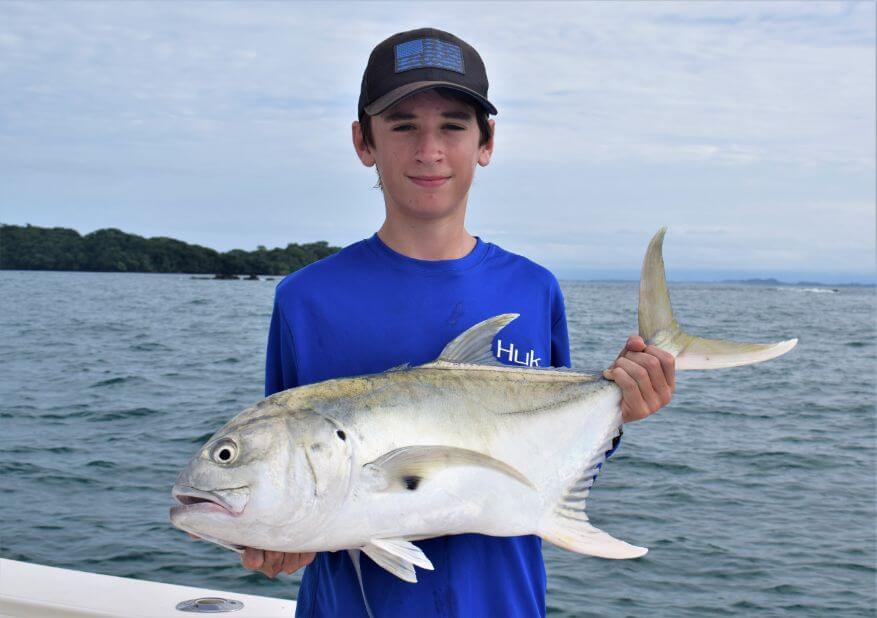 Junior angler posing with Jack Crevalle