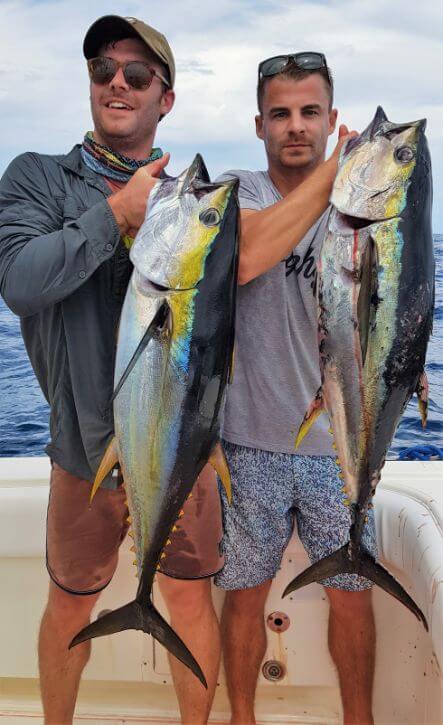 Anglers posing with Yellowfin Tuna