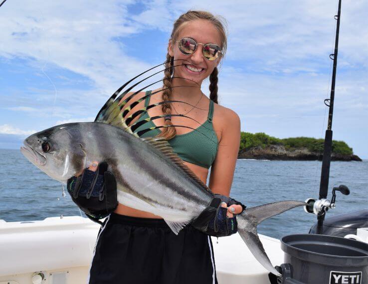 Female angler posing with roosterfish