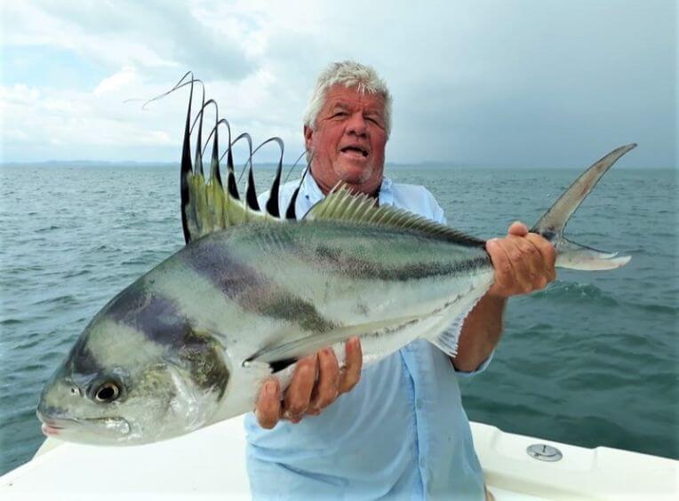 Angler posing with roosterfish.