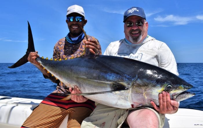 Mater and angler posing with yellowfin tuna