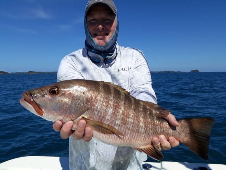 Angler holding Mexican Barred Snapper